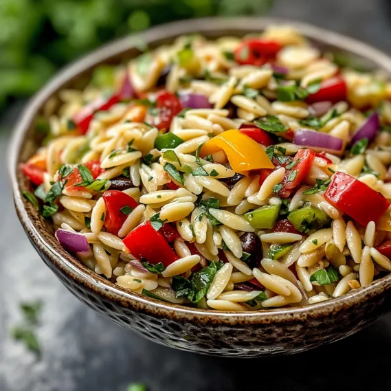 A bowl of rice with vegetables.