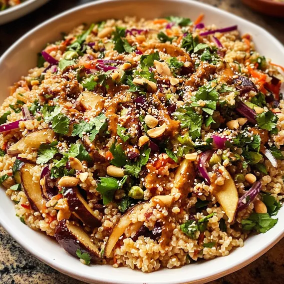 A bowl of food with a variety of ingredients.