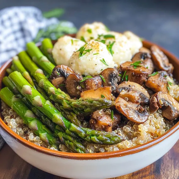 A bowl of food with mushrooms, asparagus, and other vegetables.