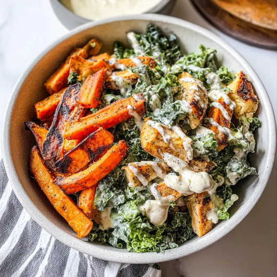 A bowl of food with a spoon in it.