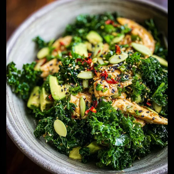 A bowl of food with broccoli and other vegetables.