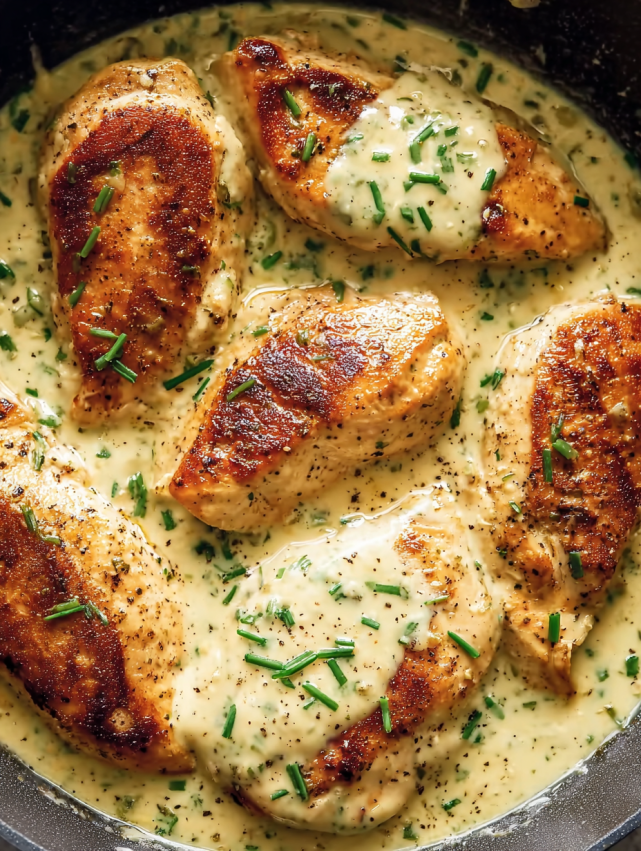 Chicken with herbs and sauce.